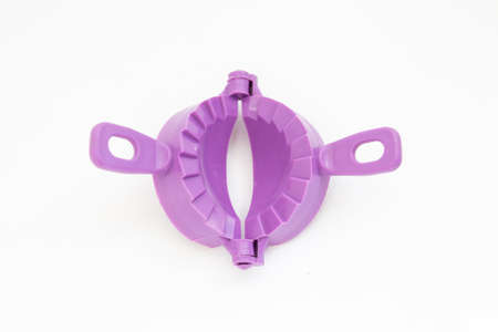 mold for dumplings on white backgroundの写真素材