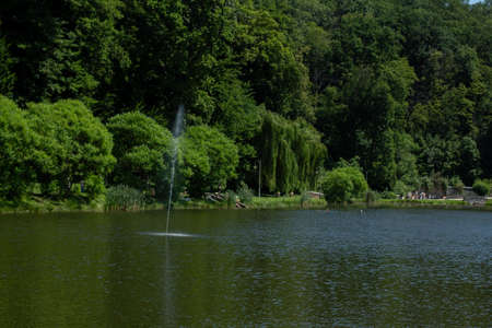 a large beautiful lake with green landscapeの写真素材