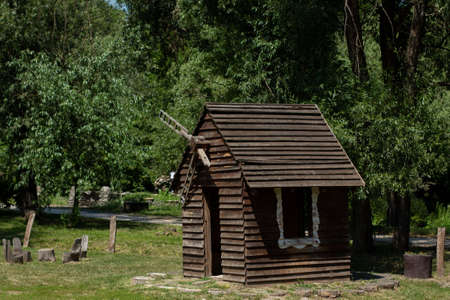small wooden house with millの写真素材