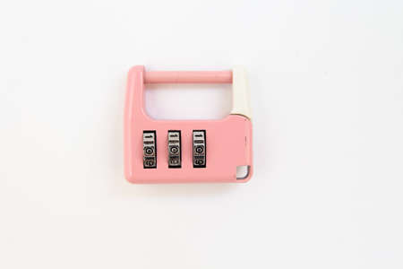 combination lock for a suitcase a white backgroundの写真素材