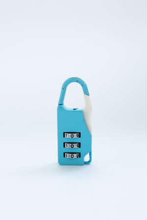combination lock for a suitcase a white backgroundの写真素材