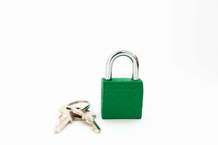 padlock with keys on a white backgroundの写真素材