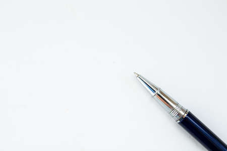 a pen on a piece of paperの写真素材
