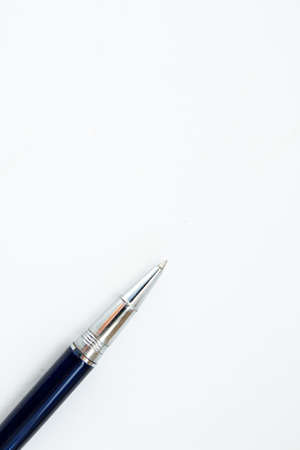 a pen on a piece of paperの写真素材