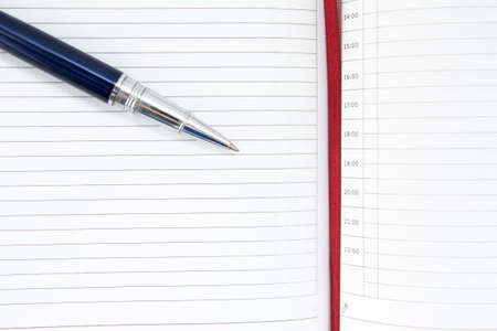 a pen on a piece of paperの写真素材