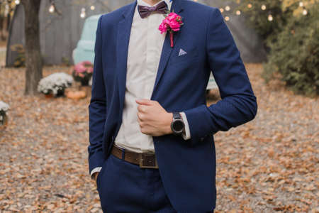 groom at the wedding in suit in the parkの写真素材