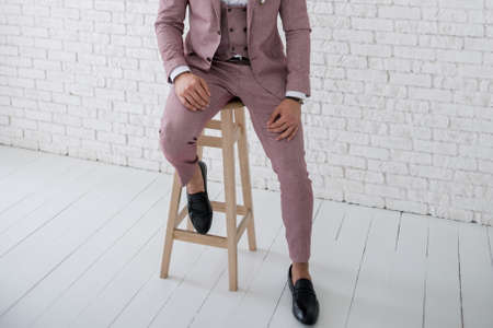 a man in a suit in the studio