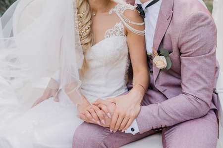 bride and groom in the garden at weddingの写真素材