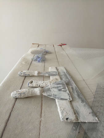 spatula for painters on wooden chairの写真素材
