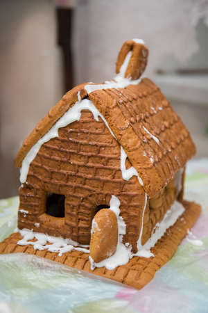 making a gingerbread house on kitchen table