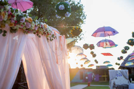 arch for a wedding ceremony in green meadow