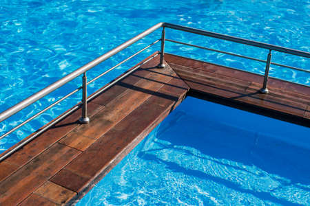 swimming pool in complex with blue water