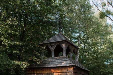 an old wooden church in the forestの写真素材