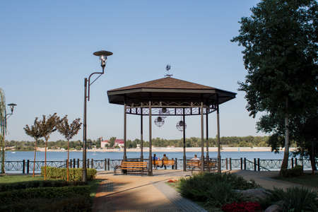 beautiful gazebo in the park on the riverの写真素材