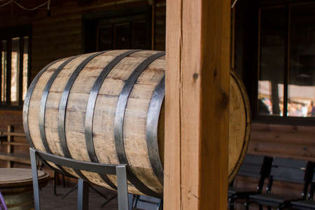 a wine wooden barrel in a winery
