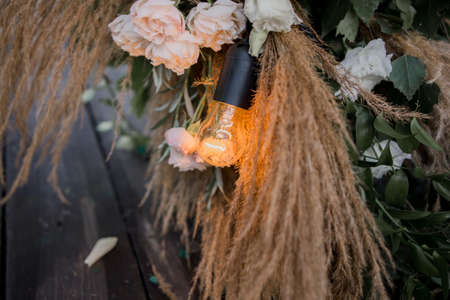 a beautiful wedding arch with flowers close upの写真素材