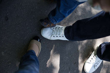 a feet in mom, dad and baby shoes