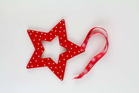 a red star for christmas tree on white backgroundの写真素材
