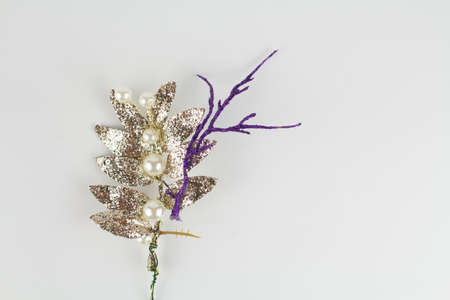 christmas decoration silver twig on a white backgroundの写真素材