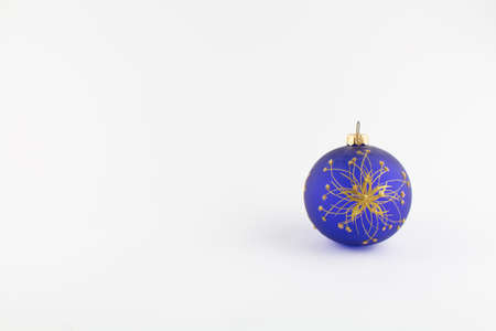 a blue ball for christmas tree on white backgroundの写真素材