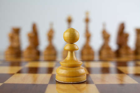 a first step white chess wooden pieceの写真素材