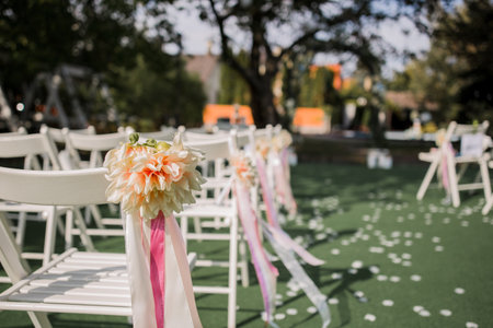 chairs for a wedding ceremony with decor in parkの写真素材