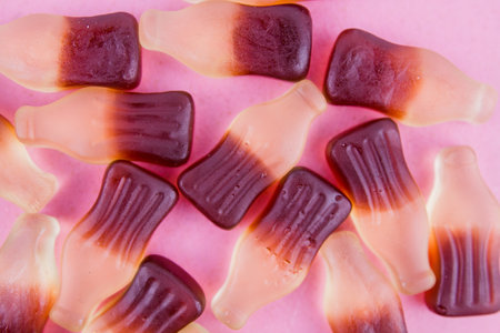 a jelly candies in the form of bottles on the tableの写真素材