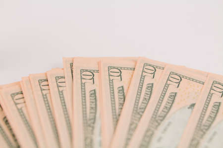 a ten dollar bills on white background