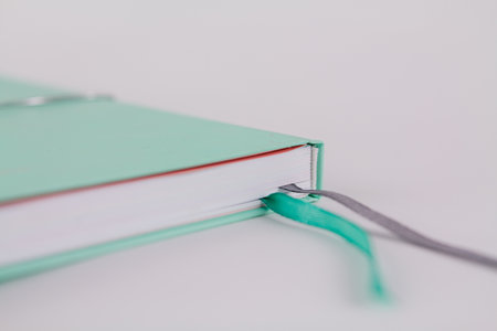 a beautiful female notebook for work or diary on a white background
