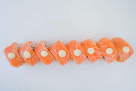 a sushi roll philadelphia with salmon on a plate japanese cuisineの写真素材