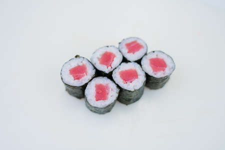 a maki roll with tuna and rice japanese cuisine deliveryの写真素材