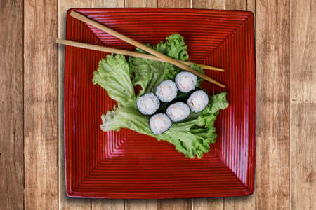 a sushi roll maki with shrimp and lettuce japanese cuisine deliveryの写真素材