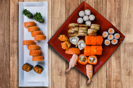 set of sushi rolls from fish and seafood a set of different videos japanese cuisine deliveryの写真素材