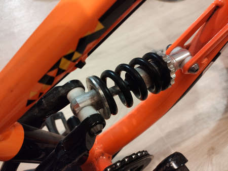a shock absorber on children's bike close-up spare partの写真素材