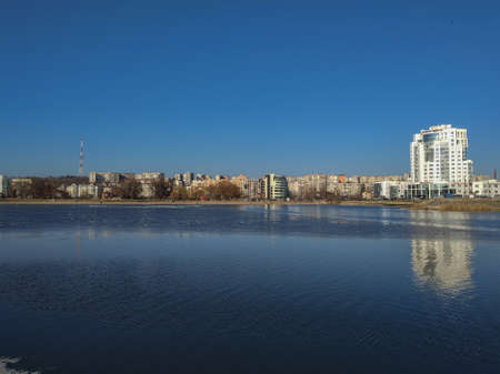 view from the river with the city in the backgroundの写真素材