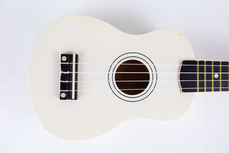 a strings of a beautiful white guitar close-up on a white background ukuleleの写真素材