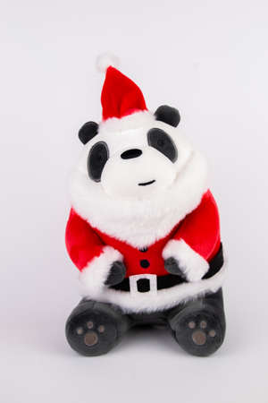 a panda dressed as santa for christmas new yearの写真素材