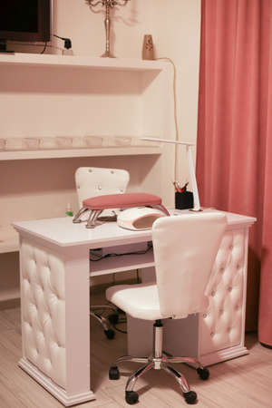 a workplace of the master for manicure chair table and devices nailsの写真素材
