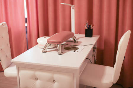 a workplace of the master for manicure chair table and devices nailsの写真素材