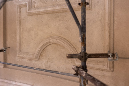 a restoration of an old italian castle with scaffoldingのeditorial素材