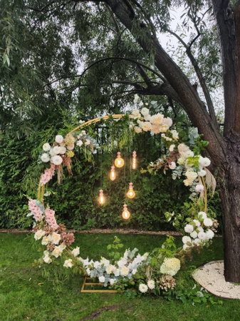 a round arch for a wedding ceremony with light bulbsの写真素材