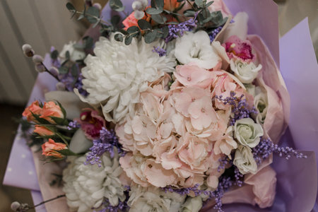beautiful festive bouquet of flowers in a restaurant on a wedding day of birthの写真素材