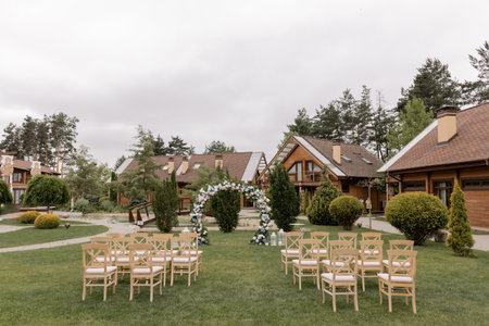 arch for a wedding ceremony in a flower gardenの写真素材