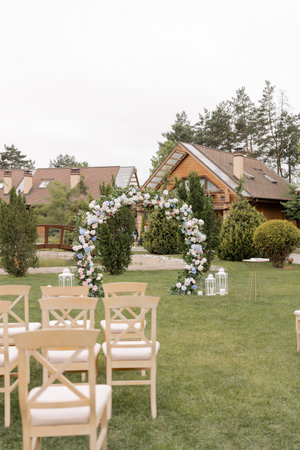 arch for a wedding ceremony in a flower gardenの写真素材