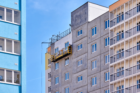 construction of a multi-storey building in a young neighborhoodの写真素材