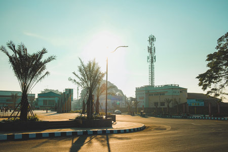 a portrait of a city park that is still quiet in the morning and illuminated by the sunの写真素材