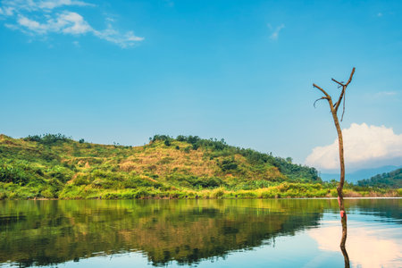 Landscape of lake and mountain in the morning, Kanchanaburi, Thailandの写真素材