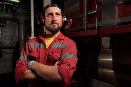 Mechanic ship main engine on dark background. Industrial marine engine. Ship engine room. Ship...