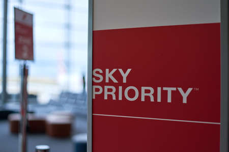 Paris Airport - Circa July 2019: Sky priotiy sign on a check-in in airport terminalのeditorial素材