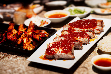 Vertical shot of delicious barbecue with chilli sauceの素材
